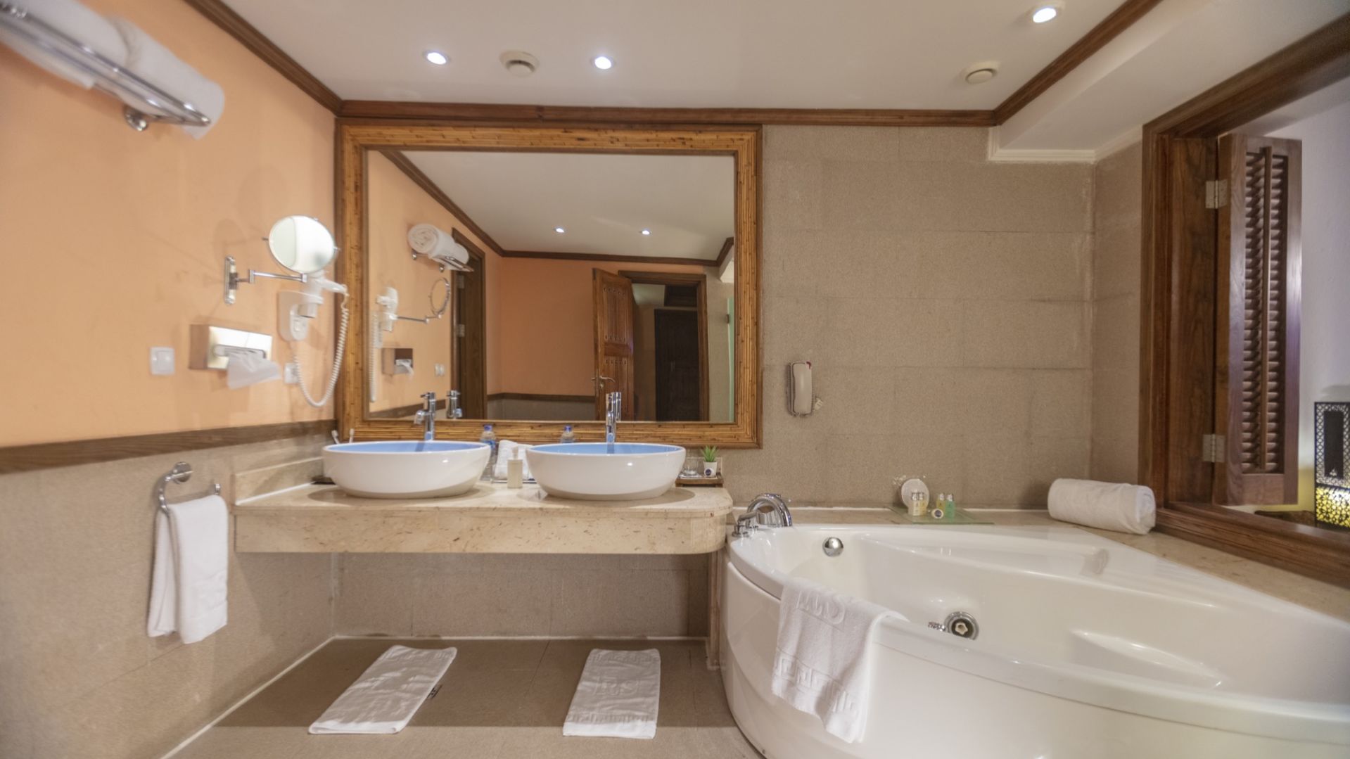 A Double Sink And Large Mirror