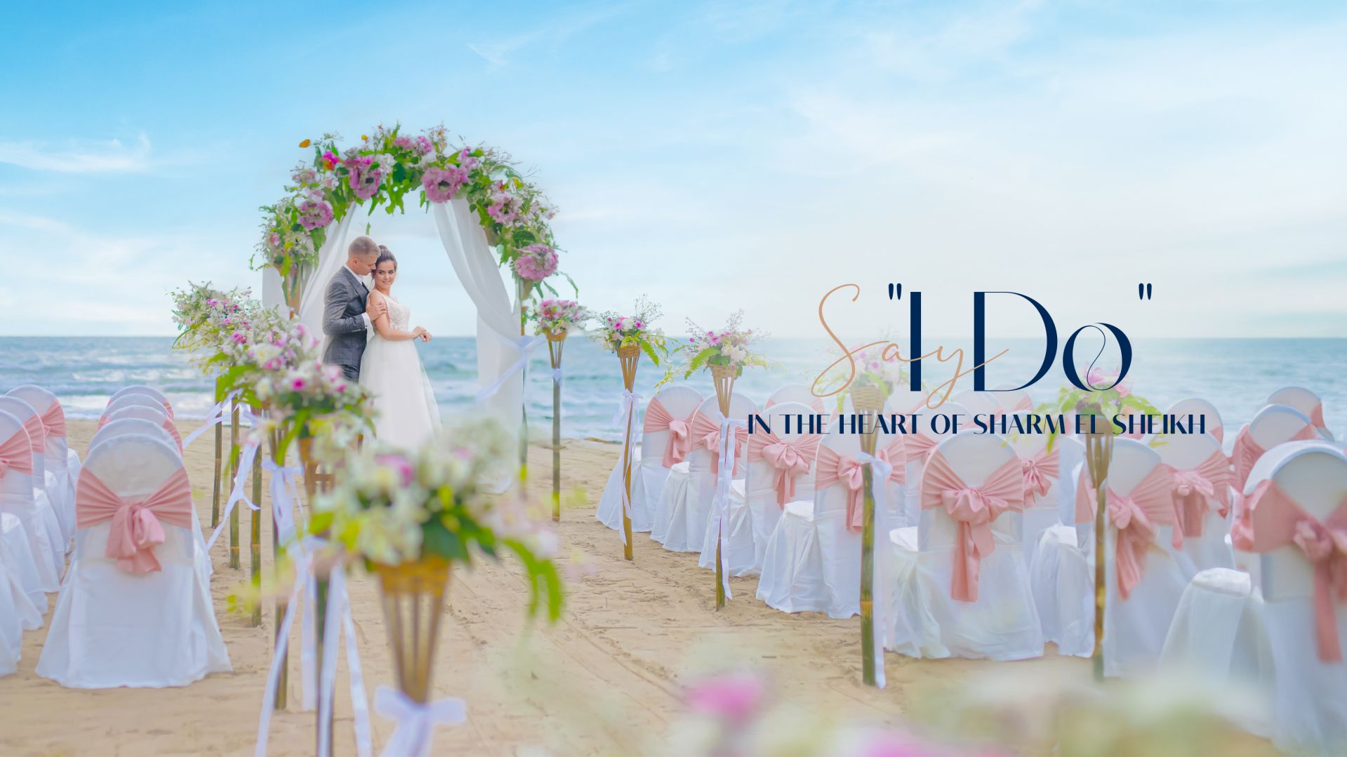 A Bride And Groom Kissing On A Beach