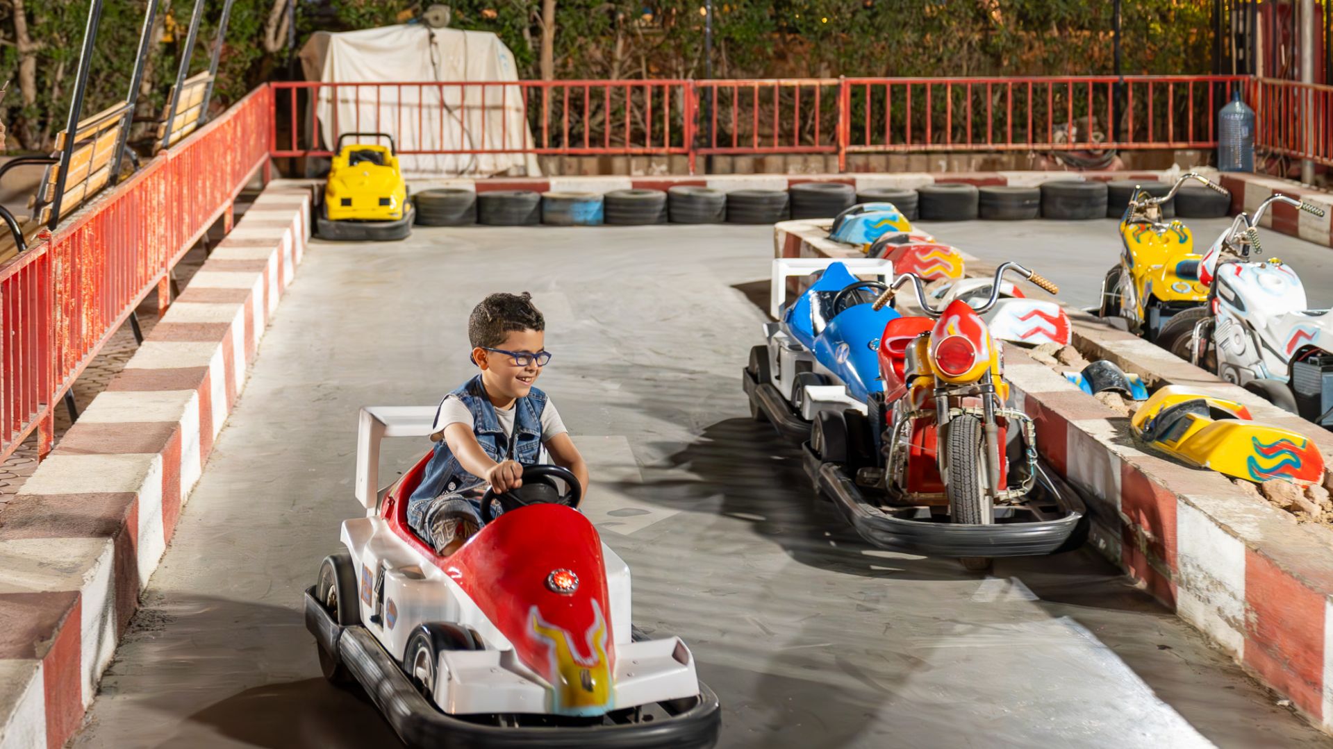 A Boy Driving A Go Kart